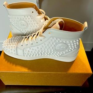 All white Christian Louboutin Louis flat calf/spikes in excellent condition.